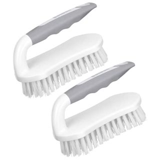 2 side on views of Setsail Scrub Brush with white bristles and gray rubber ergonomic easy grip handles