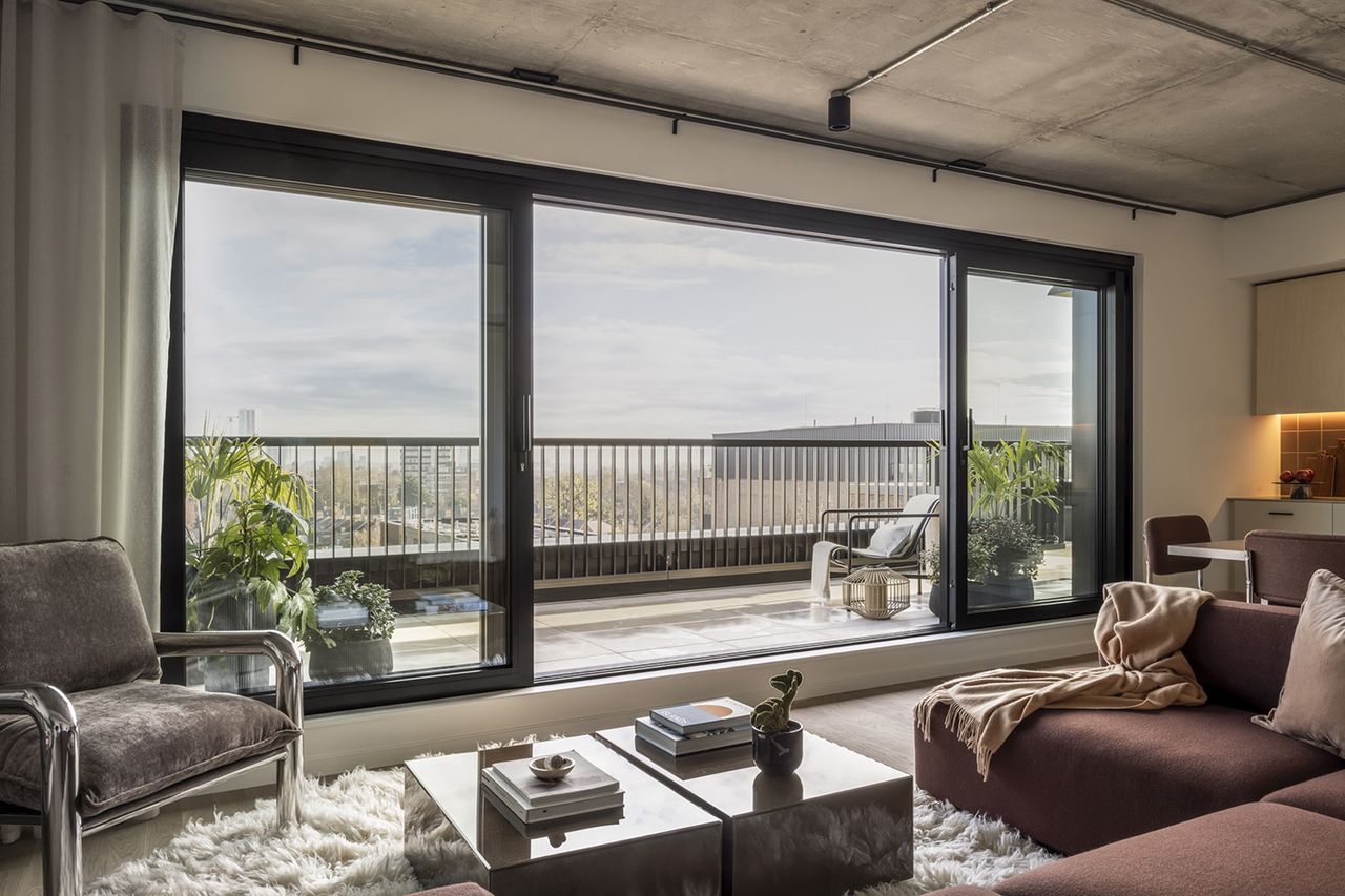 living room opening up to terrace at Vabel Lawrence Penthouse