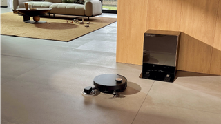 Promotional image showing the Dreame X60 Pro Ultra Complete in action