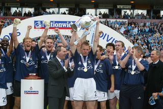 Stuart Pearce the captain of Man City lifts the First Division Championship Trophy after the Nationwide First Division game between Manchester City and Portsmouth at Maine Road, Manchester. DIGITAL IMAGE. Mandatory Credit: Alex Livesey/Getty Images