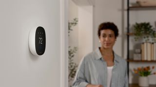 Ecobee Smart Thermostat Essential attached to wall