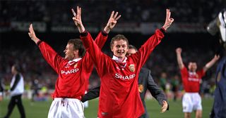 Match goalscorers Teddy Sheringham and Ole Gunnar Solskjaer of Manchester United celebrate with a treble salute after the UEFA Champions League Final between Bayern Munich v Manchester United at the Nou camp Stadium on 26 May, 1999 in Barcelona, Spain. Bayern Munich 1 Manchester United 2. 