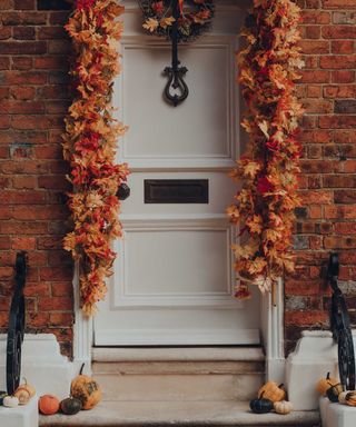 autumnal leaf wreath around door