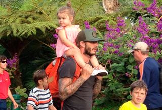 David Beckham carried Harper on his shoulders at Legoland