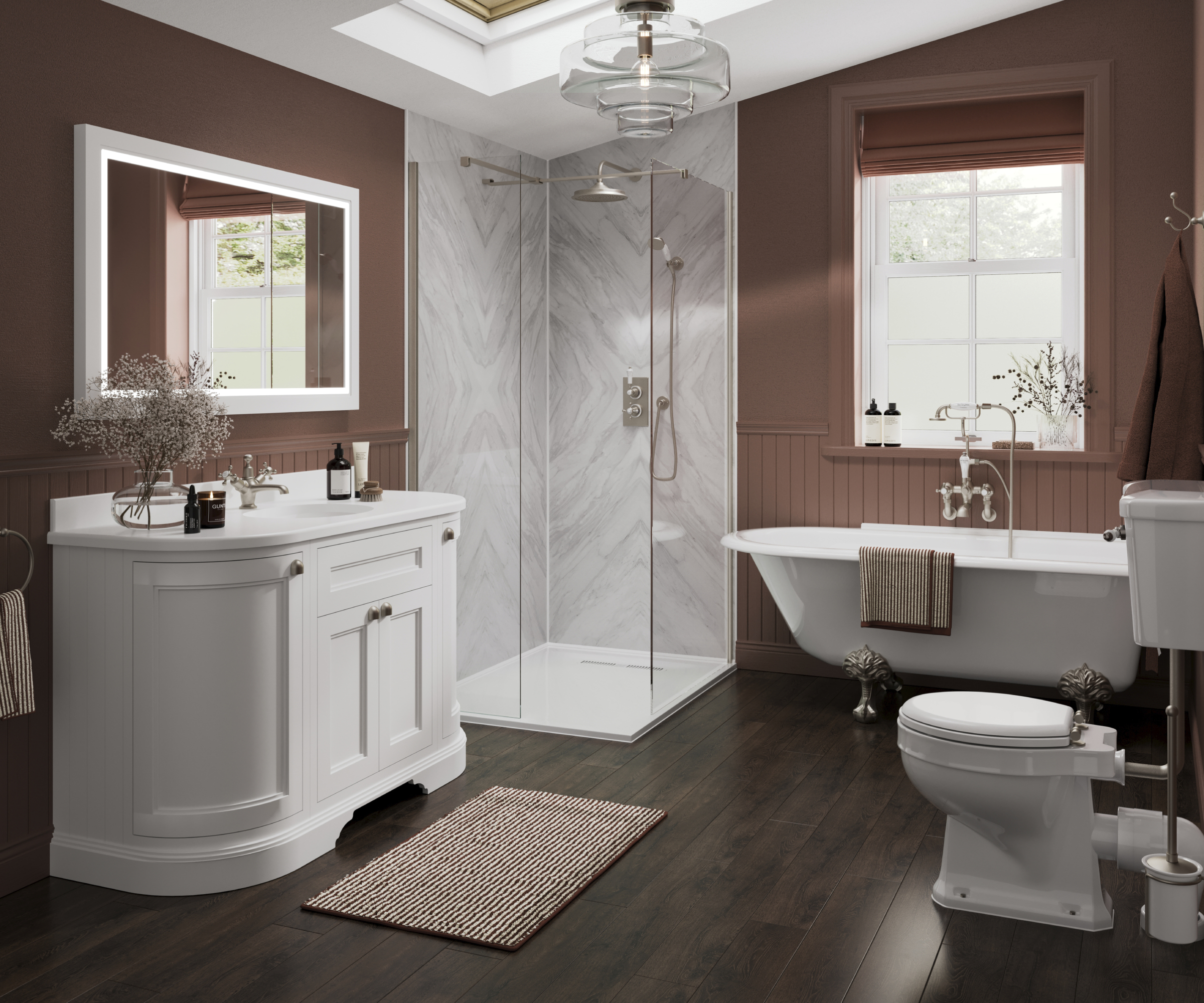 elegant bathroom with roll top bath, walk in shower, curved panelled vanity unit, dark wooden floor and dark dusty pink walls