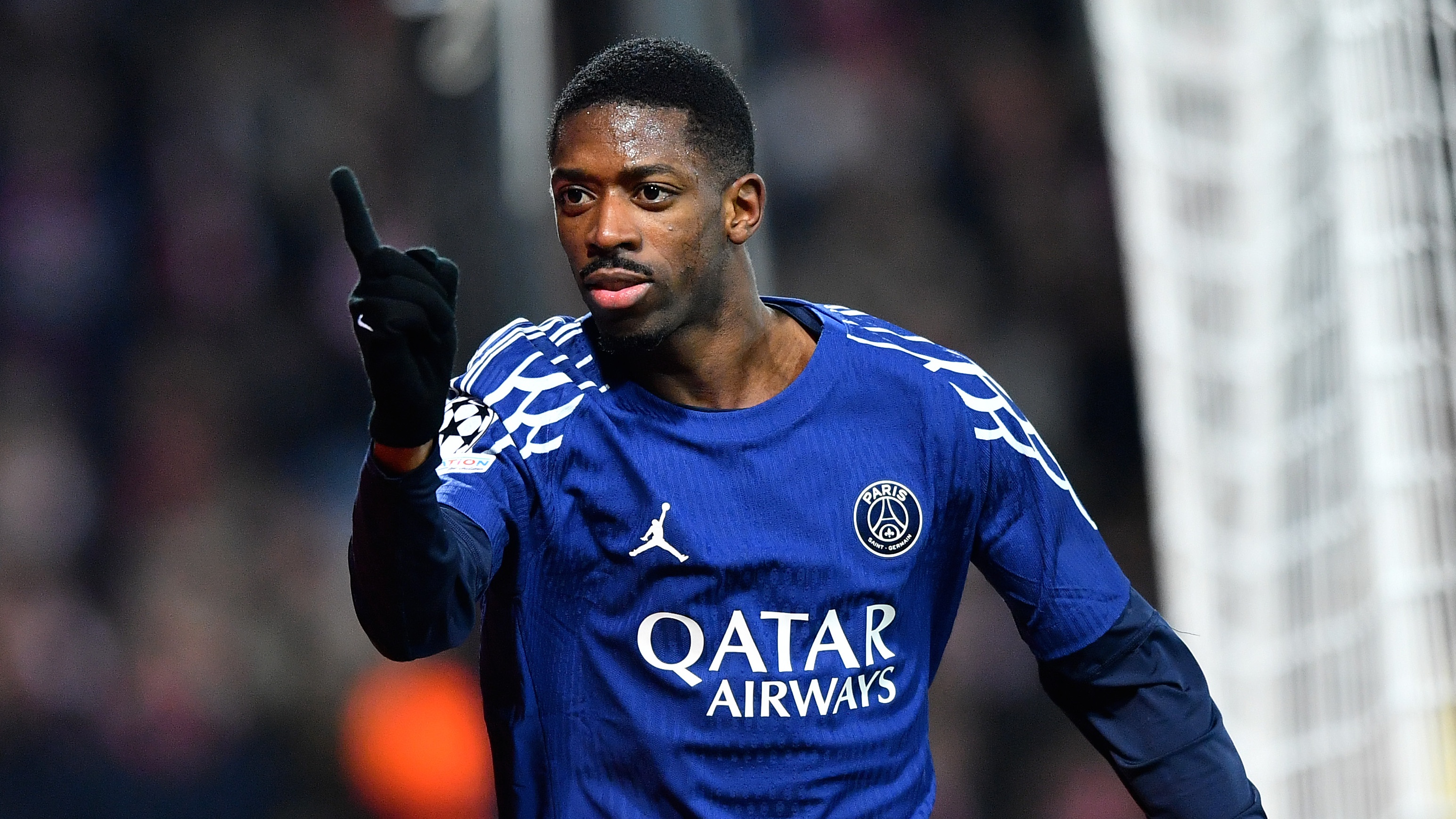 Ousmane Dembele celebrates his goal in the Champions League.