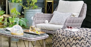 woven outdoor furniture including armchair coffee table and pouffe to highlight mistakes when buying outdoor furniture with the wrong materials
