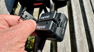 Godox Magic XT1 microphone held in a hand