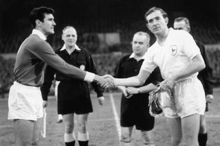 Benfica captain Jose Aguas shakes hands with Spurs skipper Danny Blanchflower in the teams' European Cup semi-final second leg at White Hart Lane in April 1962.