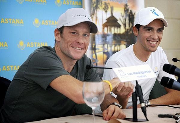 Armstrong and Contador have no trouble with each other and demonstrated with a hand shake.