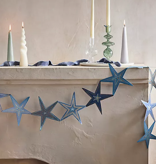 Hanukkah garland with blue stars.