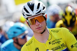 LOULE PORTUGAL FEBRUARY 20 Remco Evenepoel of Belgium and Team QuickStep Alpha Vinyl yellow leader jersey prior to the 48th Volta Ao Algarve 2022 Stage 5 a 173km stage from Lagoa to MalhoLoul 514m VAlgarve2022 on February 20 2022 in Loule Portugal Photo by Luc ClaessenGetty Images