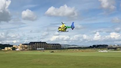 A helicopter landing on St Andrews Old Course