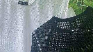 Close-up of two mesh T-shirts