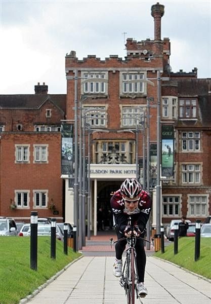 David Zabriskie (CSC) leaves his hotel.