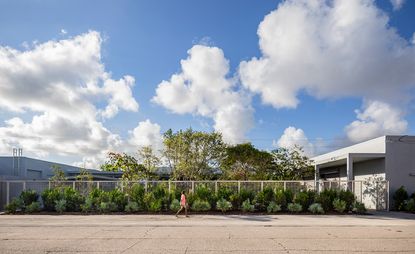 Pavement outside of white building