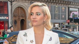 pixie lott on the street with a curved chopped bob haircut
