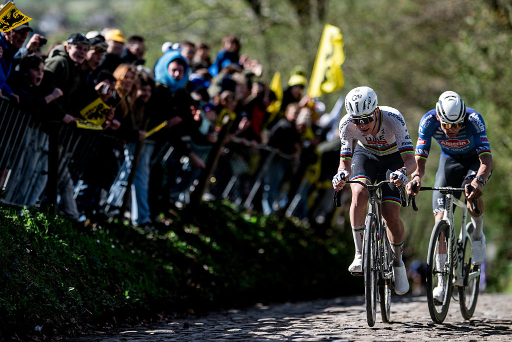 OUDENAARDE, BELGIUM - APRIL 05: (L-R) Tadej Pogacar of Slovenia and UAE Team Emirates - XRG and Mathieu van der Poel of Netherlands and Team Alpecin-Premier Tech compete in the breakaway passing through the Koppenberg cobblestones sector while fans cheer during the 110th Tour of Flanders - Ronde van Vlaanderen 2026 - Men&amp;amp;apos;s Elite a 278.6km one day race from Antwerp to Oudenaarde on April 05, 2026 in Oudenaarde, Belgium. (Photo by Billy Ceusters/Getty Images)