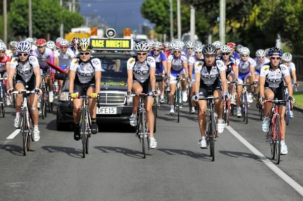 The NZCT New Zealand National Team pose for a photo at the head of the peloton.