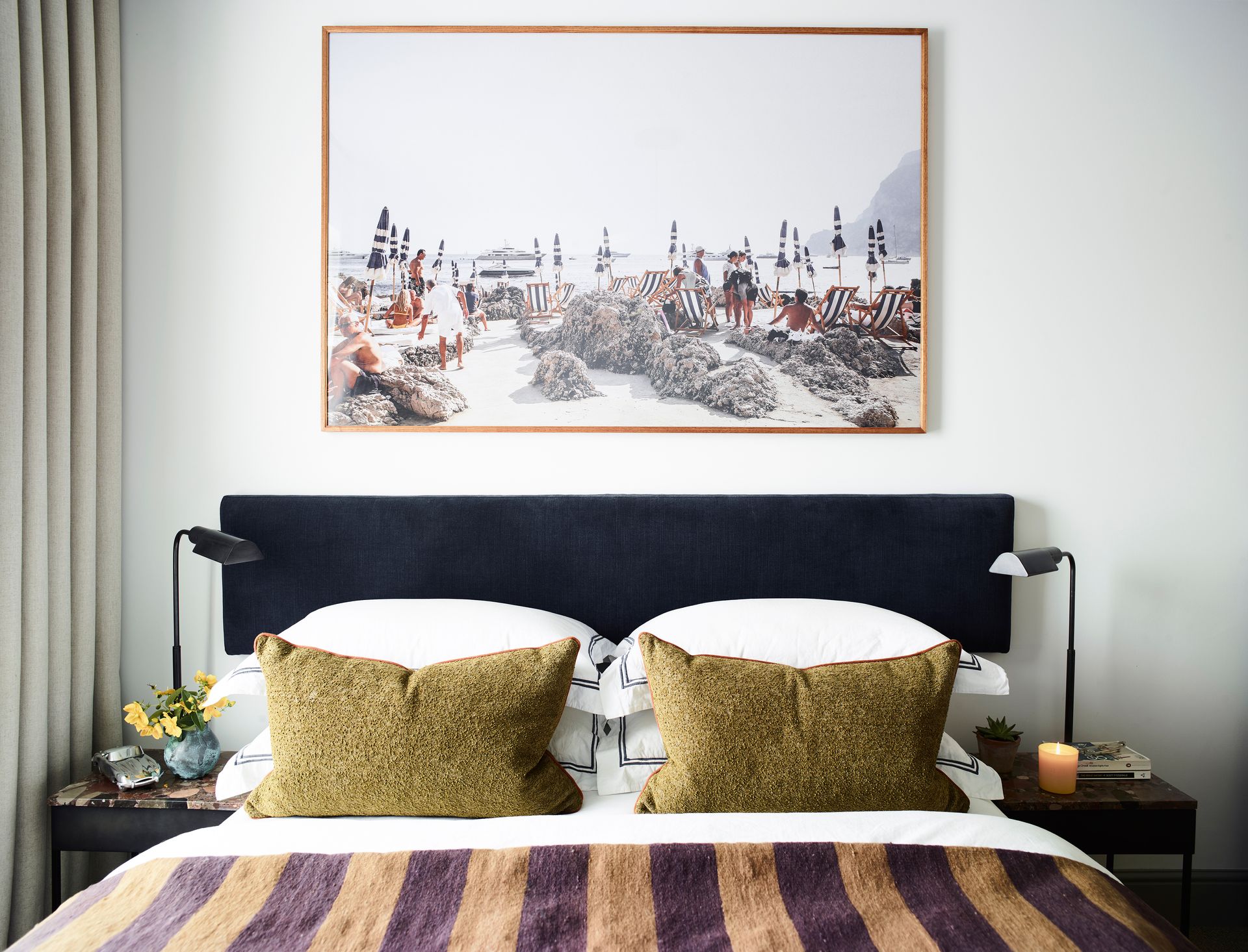 Small bedroom with artwork