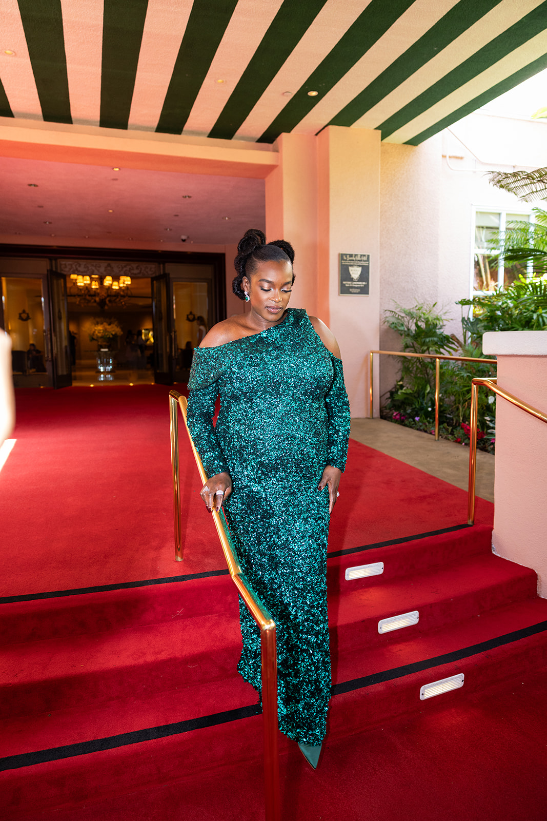 Wunmi Mosaku, star of Sinners, poses in a Louis Vuitton dress ahead of the 2026 Oscars red carpet