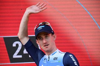 Team Jayco-AlUla&#039;s Eddie Dunbar celebrates on the podium winning the stage 11 of the Vuelta a Espana