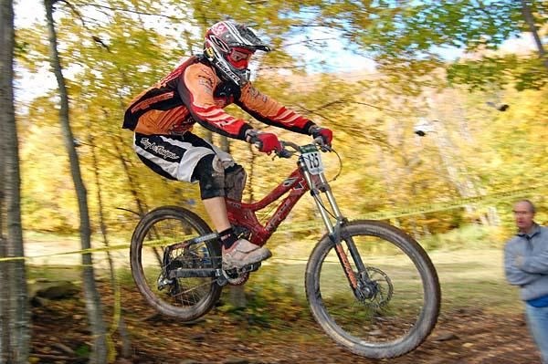 This rider keeps his weight far back for the landing.