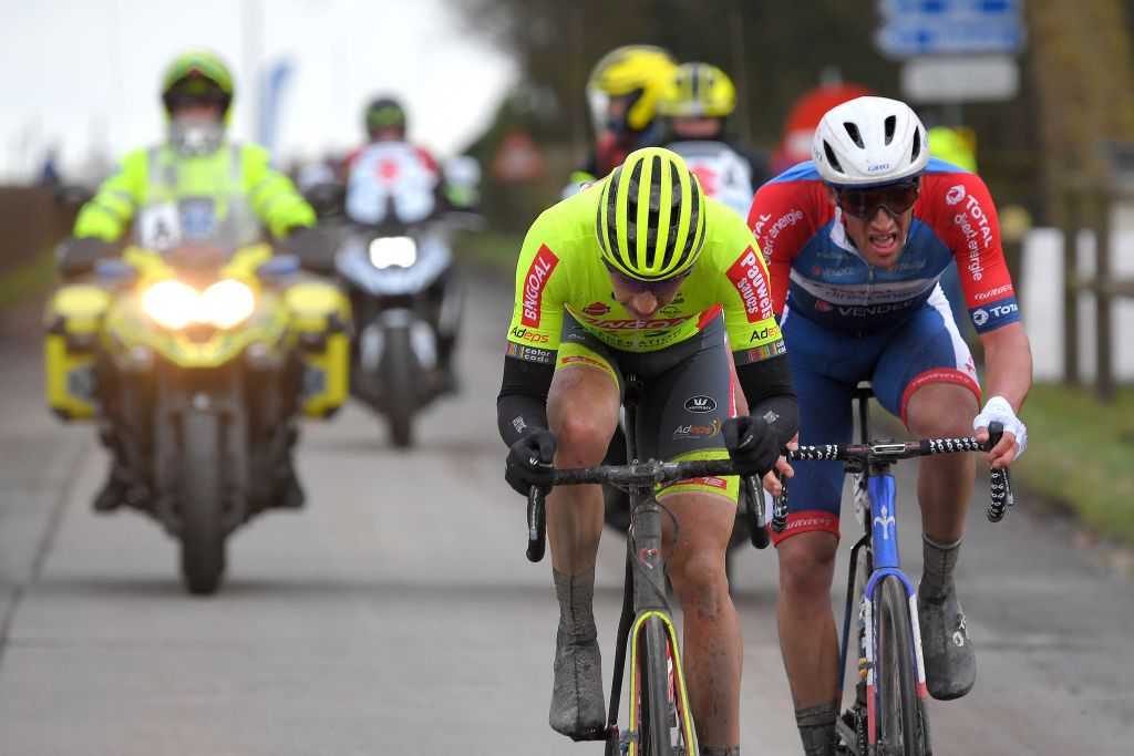 NOKERE BELGIUM MARCH 17 Ludovic Robeet of Belgium and Team Bingoal WB Damien Gaudin of France and Team Total Direct Energie during the 75th Nokere Koerse Danilith Classic 2021 Mens Elite a 1955km race from Deinze to Nokere Breakaway Attack NokereKoerse on March 17 2021 in Nokere Belgium Photo by Luc ClaessenGetty Images