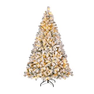 lit christmas tree with white and yellow light