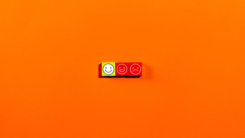 Software buyer&#039;s remorse concept image showing a yellow colored happy face with frowning face placed against an orange background.