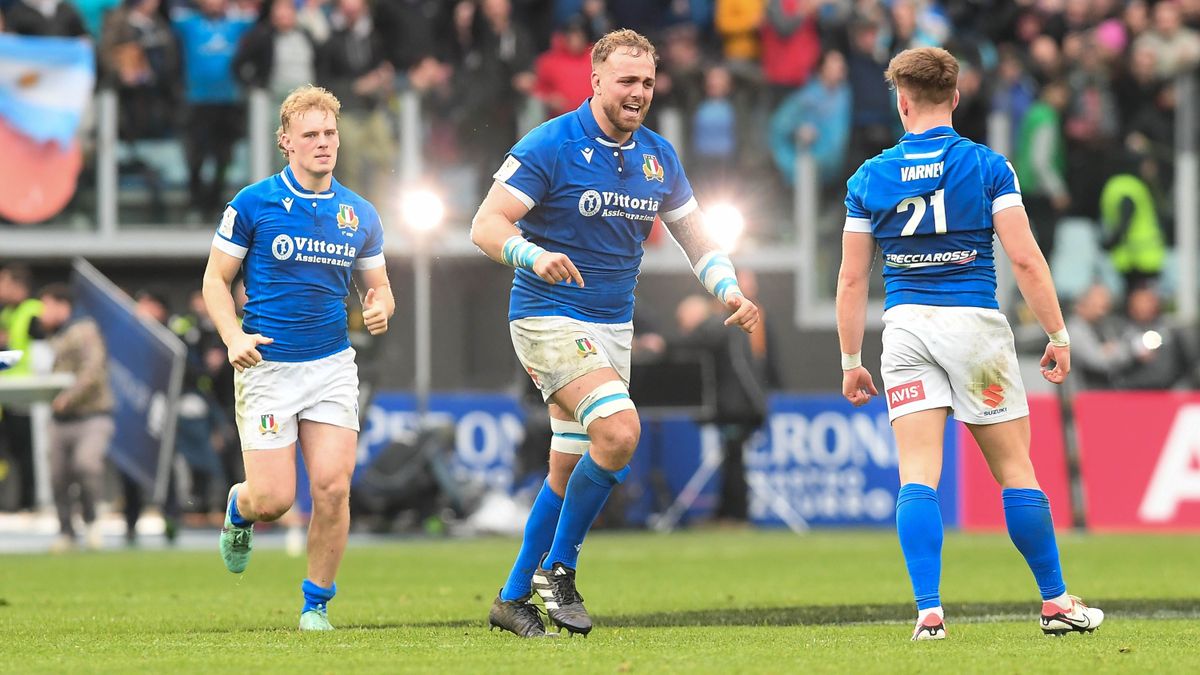 Italy players celebrate victory over Scotland in the 2024 Six Nations