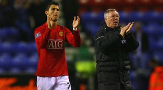 WIGAN, ENGLAND - MAY 13: Sir Alex Ferguson the manager of Manchester United and Cristiano Ronaldo celebrate after the Barclays Premier League match between Wigan Athletic and Manchester United at the JJB Stadium on May 13, 2009 in Wigan, England. (Photo by Alex Livesey/Getty Images)