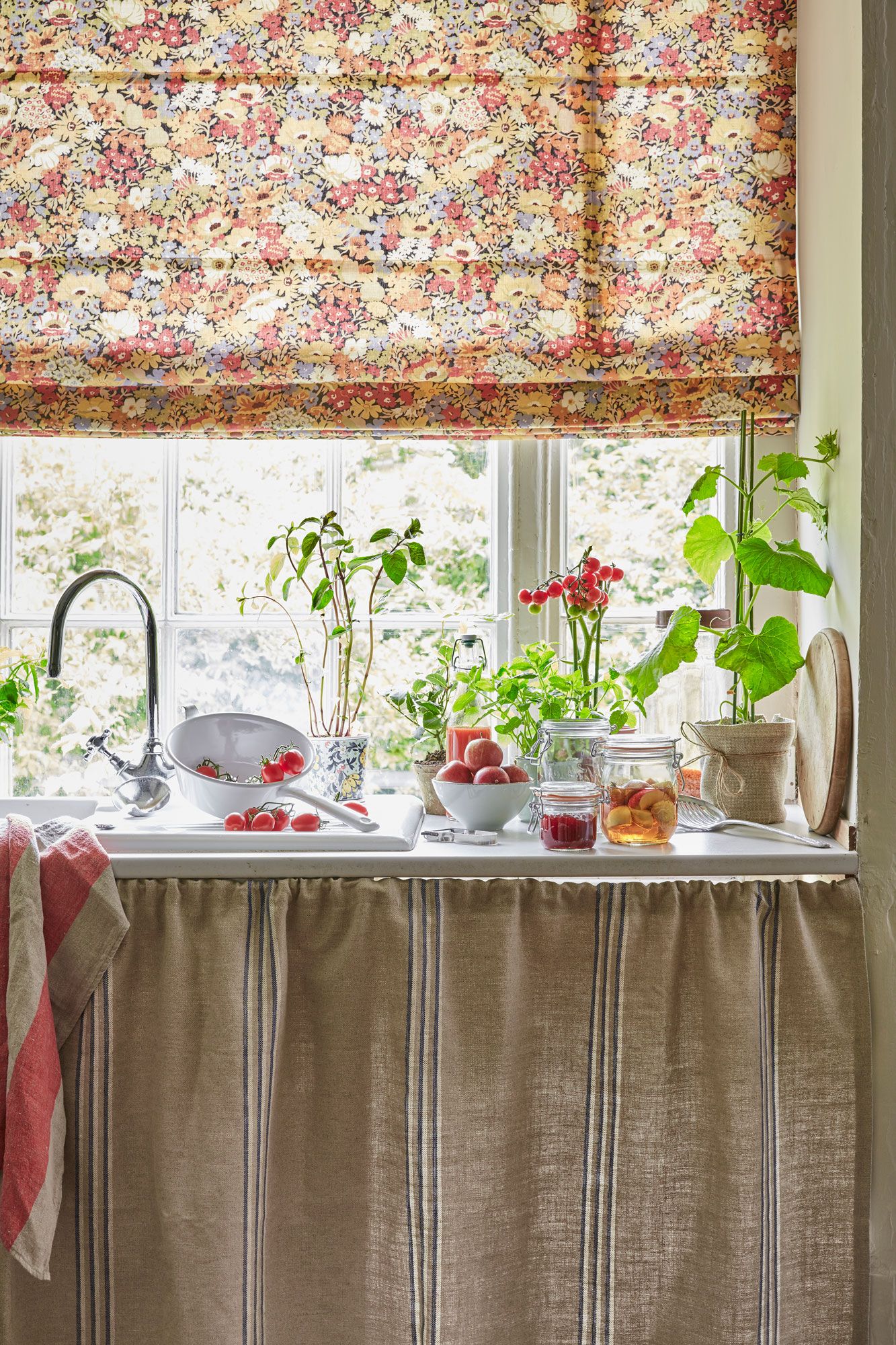 kitchen sink with curtain storage underneath
