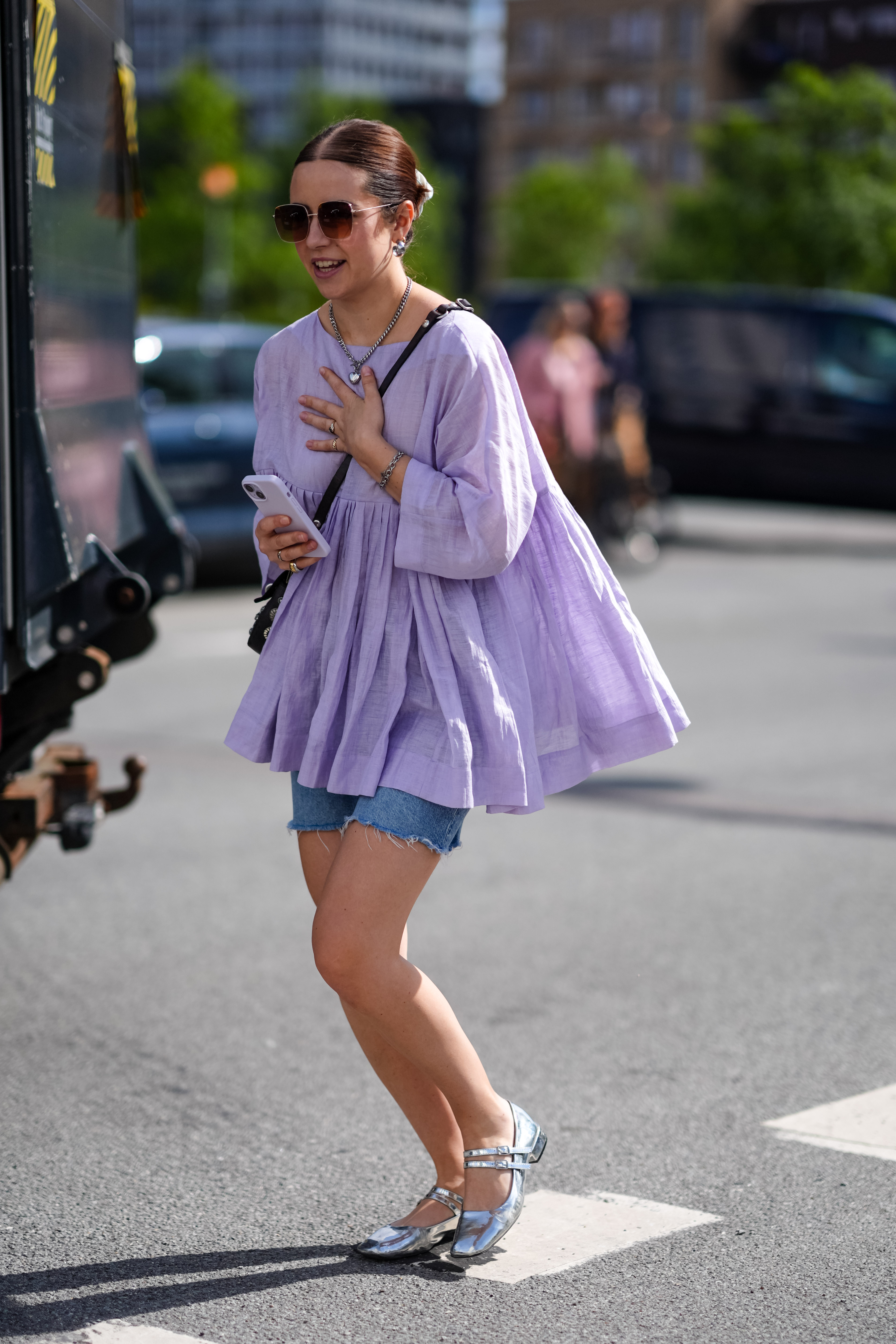 woman wearing a blazer and shorts
