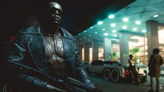Best Cyberpunk 2077 builds - A man with a gun in a leather jacket wears shades at night