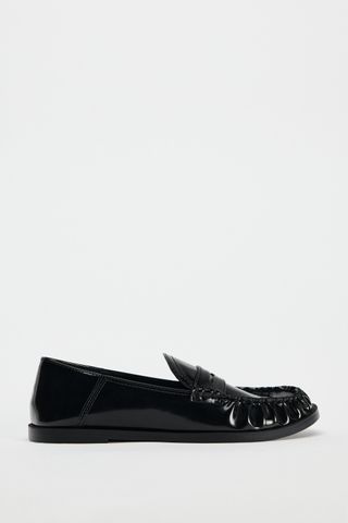 Penny loafers made of imitation patent leather