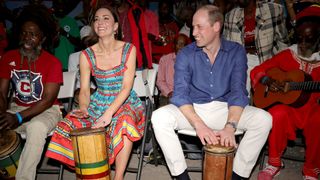 Prince William and Kate Middleton playing drums at the Caribbean