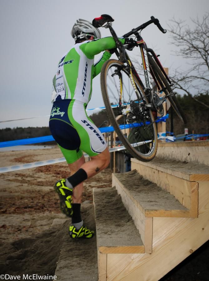 Derrick St. John (Stevens p/b The Cyclery) climbing the steps after the beach run