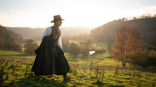 Suranne Jones walking in a field in Gentleman Jack season 2