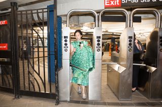Wearing Gown Whilst Entering the Subway
