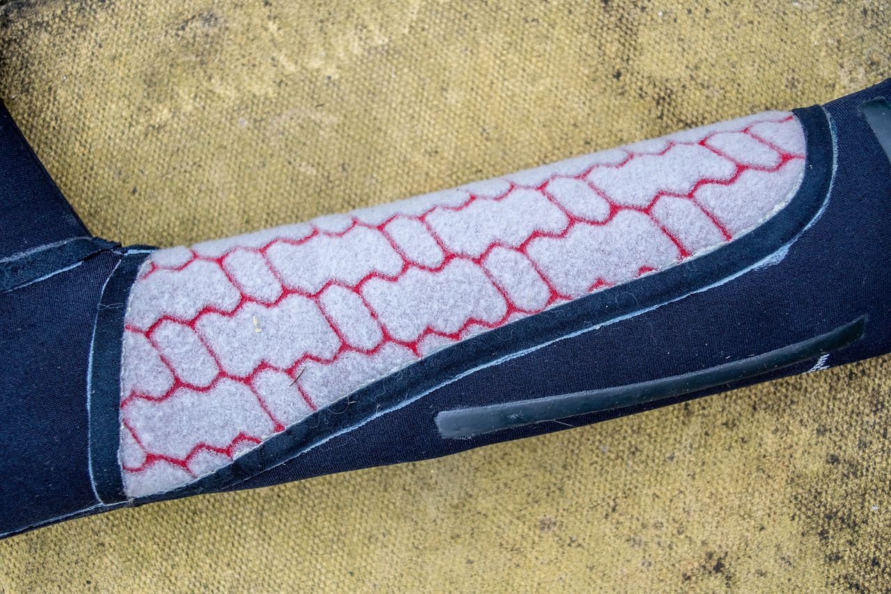 An inside out Pro Stealth overshoe showing the internal insulation
