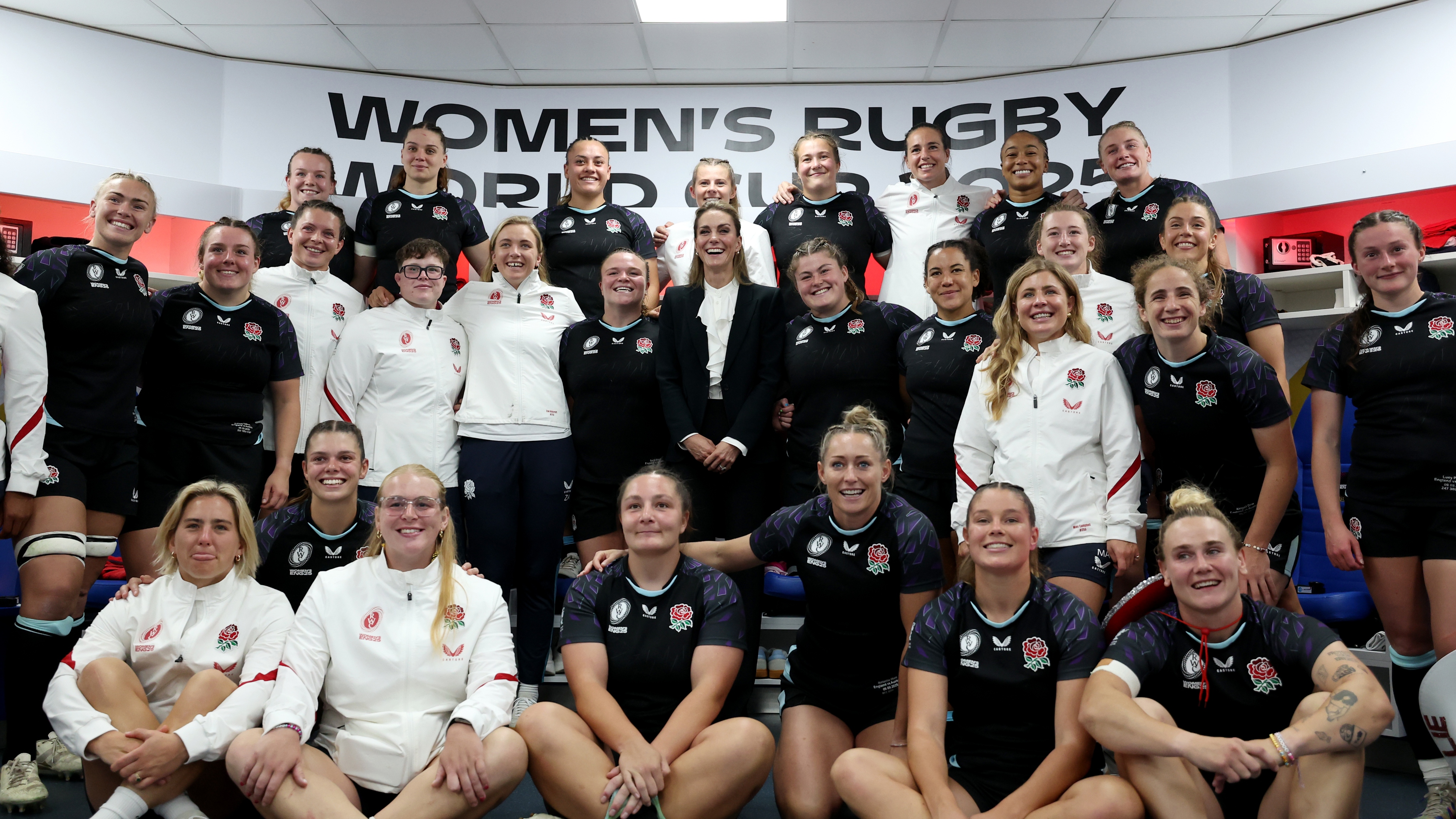 Catherine, Princess of Wales, poses for a photograph with England rugby team as they celebrate victory after defeating Australia during the Women's Rugby World Cup 2025 Pool A match