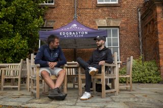 Dan Parker and Jake Field debriefing after a day's work on the patio at Edgbaston golf club