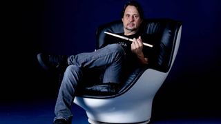 Drummer Dave Lombardo holding drumsticks