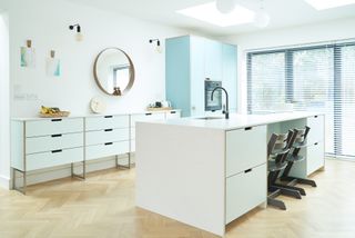 kitchen with white and light blue scheme by plykea