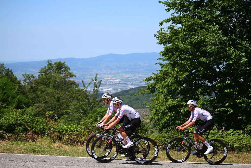 Tadej Pogačar is joined by UAE Team Emirates teammates Tim Wellens and Marc Soler on training ride around Florence, Italy on hilly roads used for stage 1 prior to 2024 Tour de France