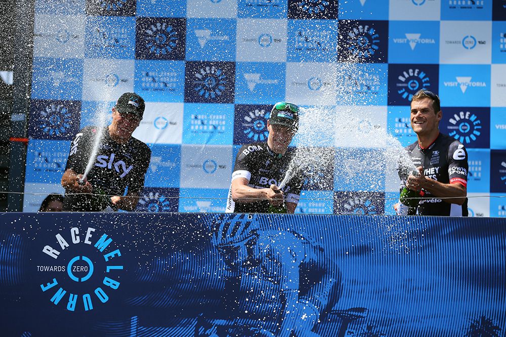 The champagne flows on the podium