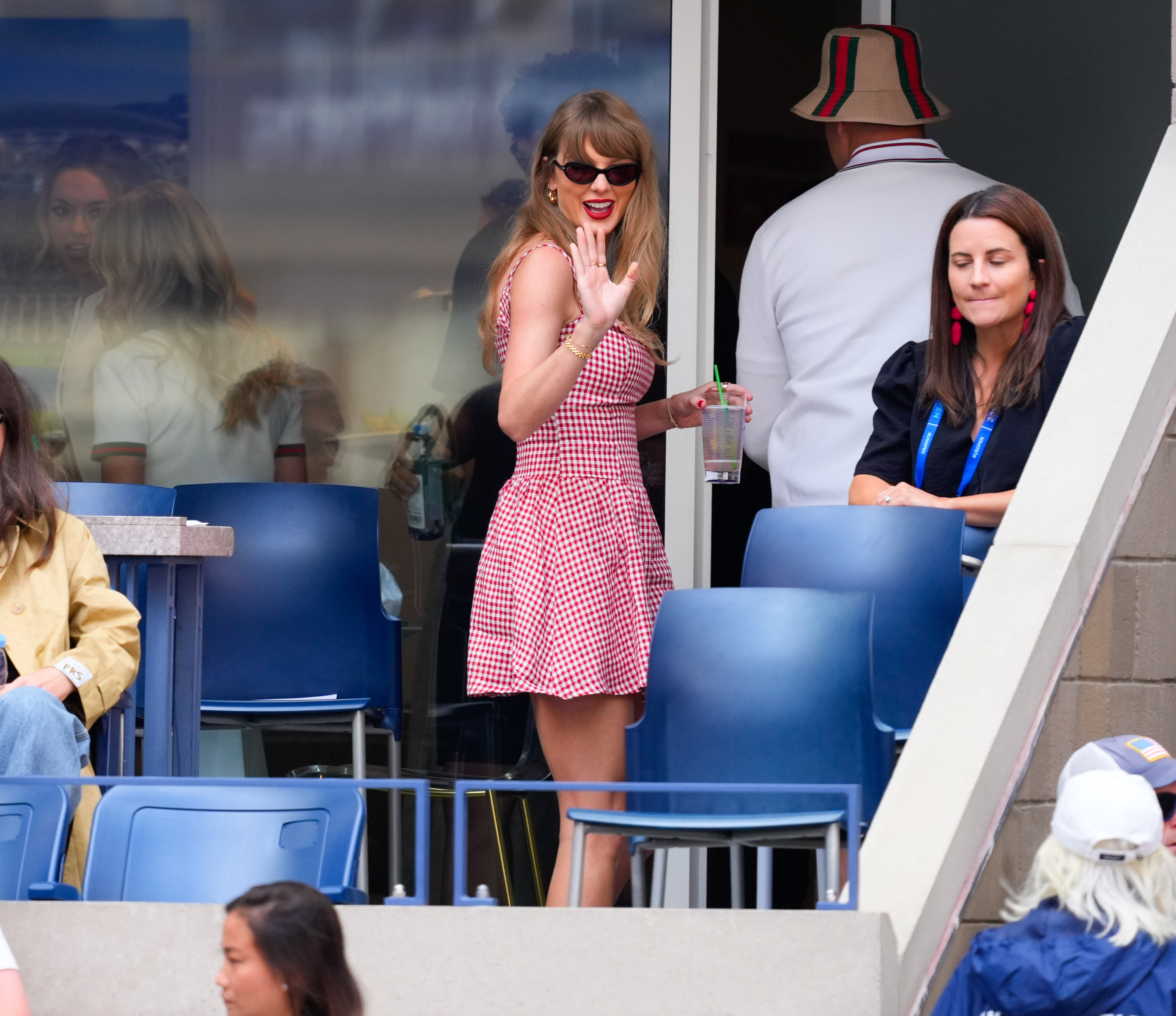 Taylor Swift at the 2024 US Open in a gingham Reformation dress
