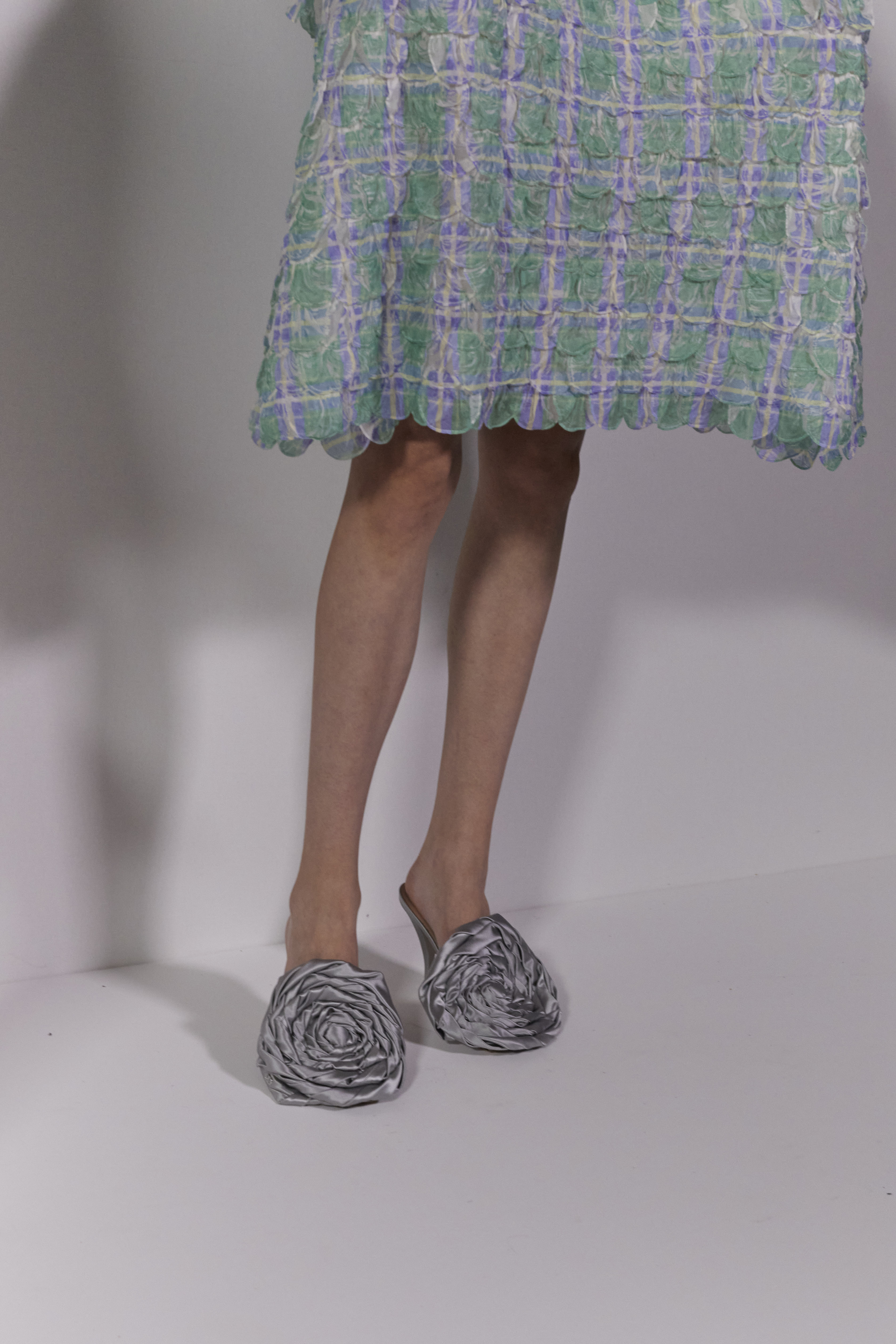 close ups of models at Dior wearing Jonathan Anderson&#039;s shoes and bags for Dior