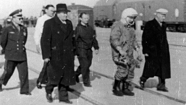 Famed Russian spacecraft S. P. Korolev (in fedora hat) and Soviet cosmonaut Yuri Gagarin walk to the launch pad on April 12, 1961 ahead of the launch of Vostok 1, which would become the first manned spaceship to send a human into space.